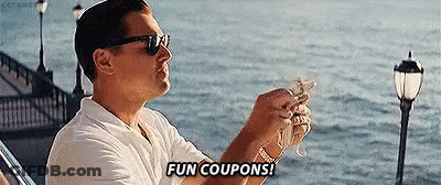 Man Sitting On Boat Holding Money Saying Fun Coupons GIF