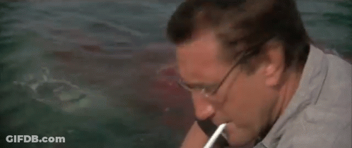 Man Sitting On Boat Looking At Bell GIF