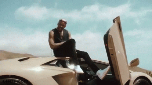 Man Sitting On Car Hood GIF
