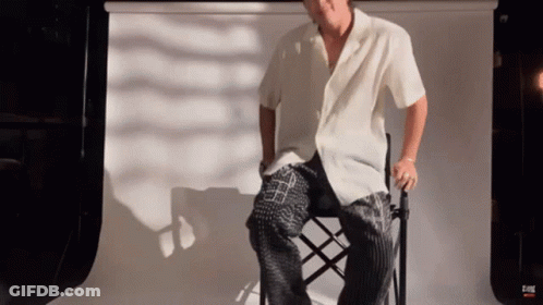 Man Sitting On Chair GIF