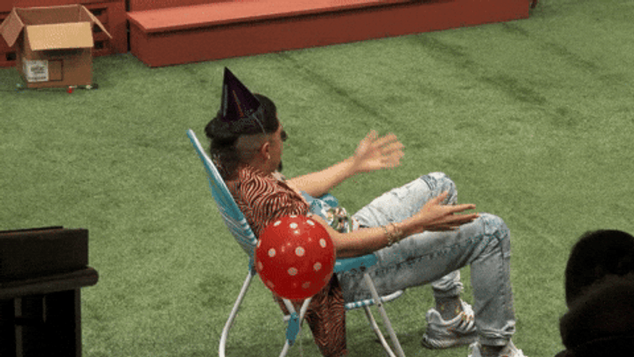Man Sitting On Chair Outside GIF