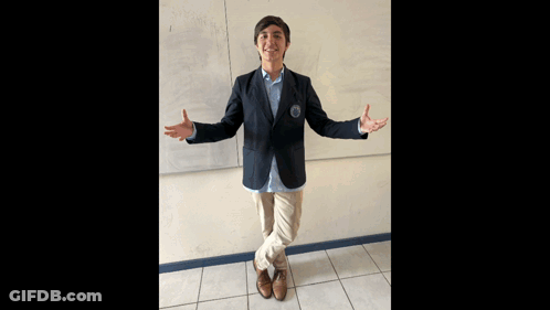Man Sitting On Chair With Legs Crossed GIF