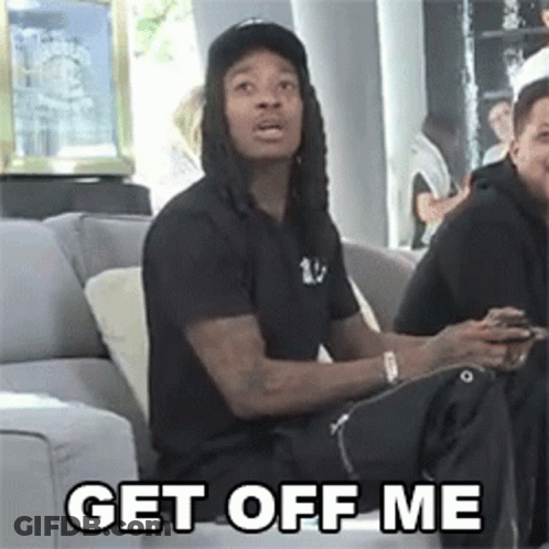 Man Sitting On Couch Get Off Me GIF