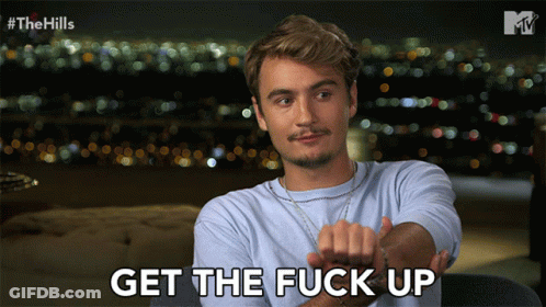 Man Sitting On Couch Get The F**k Up GIF