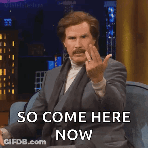 Man Sitting On Couch Giving Middle Finger GIF