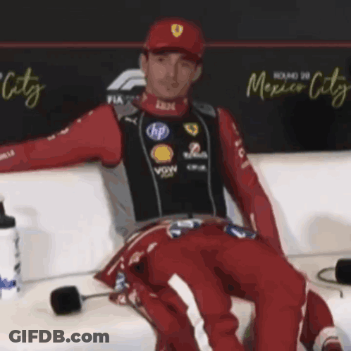Man Sitting On Couch In Front Of Mexico City Wall GIF