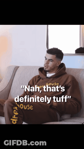 Man Sitting On Couch Nah That's Definitely Tuff GIF