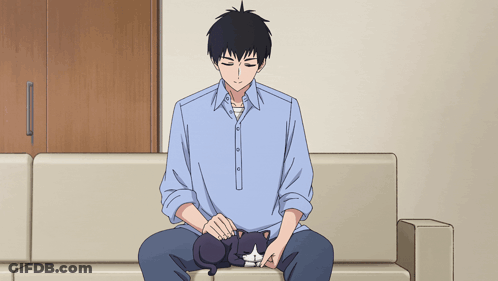 Man Sitting On Couch Petting Black Cat GIF