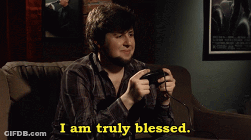 Man Sitting On Couch Playing Video Game Saying I Am Truly Blessed GIF