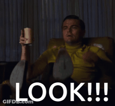 Man Sitting On Couch Pointing At Look GIF