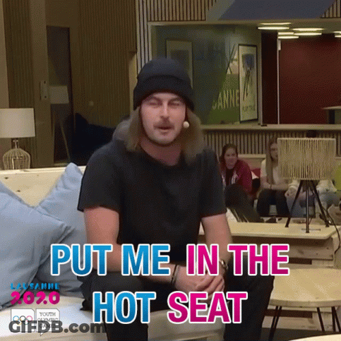 Man Sitting On Couch Put Me In The Hot Seat GIF