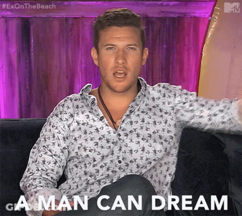 Man Sitting On Couch Saying A Man Can Dream GIF