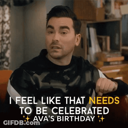 Man Sitting On Couch Saying Celebrate GIF
