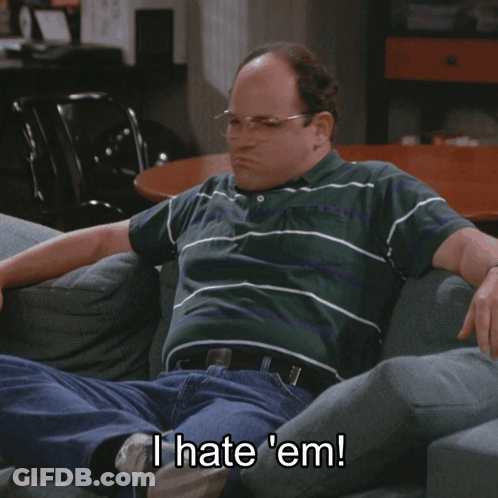 Man Sitting On Couch Saying I Hate 'Em GIF
