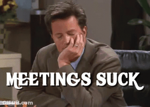 Man Sitting On Couch Saying Meetings Suck GIF