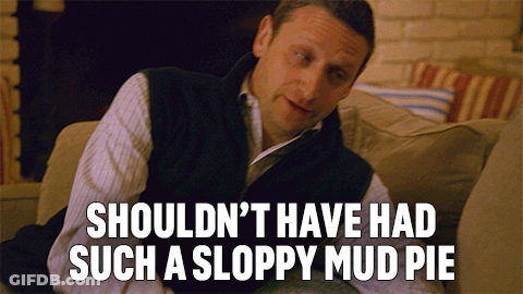 Man Sitting On Couch Saying Shouldn't Have Had Such A Sloppy Mud Pie GIF