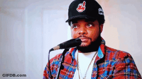 Man Sitting On Couch Saying They Tryna Make Me Feel GIF