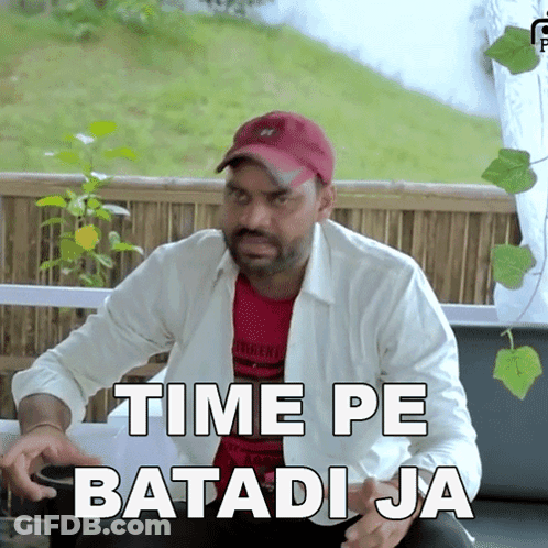 Man Sitting On Couch Saying Time Pe Batadi Ja GIF
