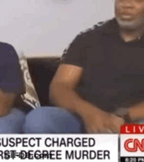 Man Sitting On Couch Talking To Another Man On CNN GIF