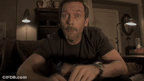 Man Sitting On Couch Wearing Nico Shirt GIF