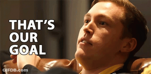 Man Sitting On Couch With Goal Text GIF