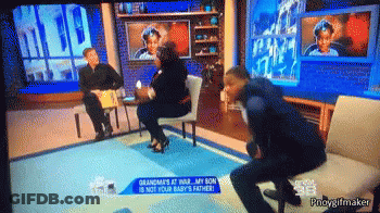 Man Sitting On Couch With Grandma's At War Sign GIF
