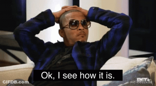 Man Sitting On Couch With Hands On Head GIF