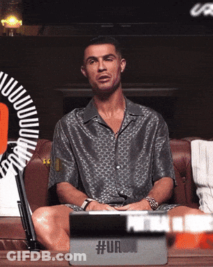 Man Sitting On Couch With Legs Crossed In Front Of Tablet #Ur GIF