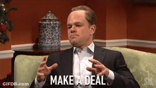 Man Sitting On Couch With Make A Deal GIF