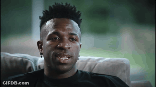 Man Sitting On Couch With Mouth Open GIF