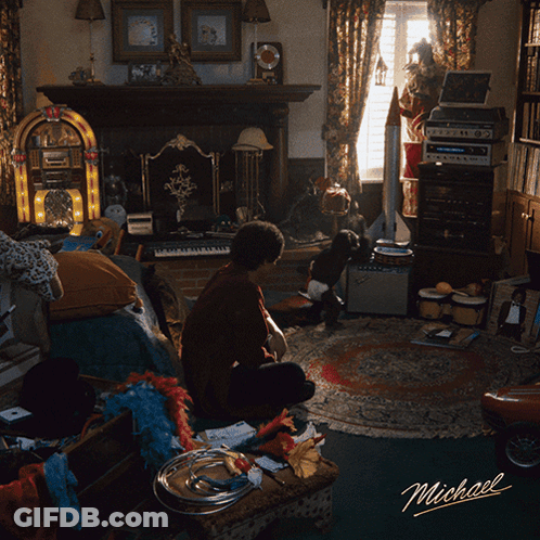 Man Sitting On Couch With Name Michael GIF