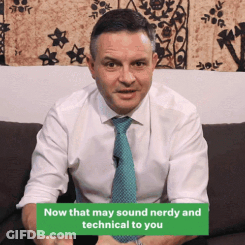 Man Sitting On Couch With Now Sign GIF