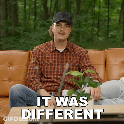 Man Sitting On Couch With Plant Saying It Was Different GIF
