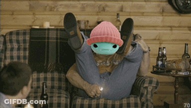 Man Sitting On Couch With Stuffed Animal On Head Number 70 GIF