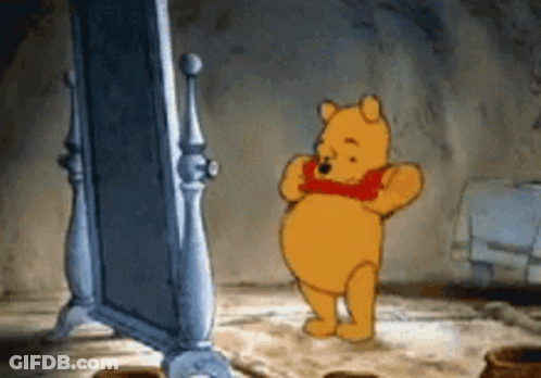 Man Sitting On Counter With Hands On Stomach GIF