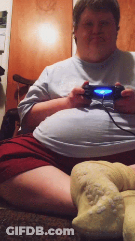 Man Sitting On Floor Playing Video Game GIF