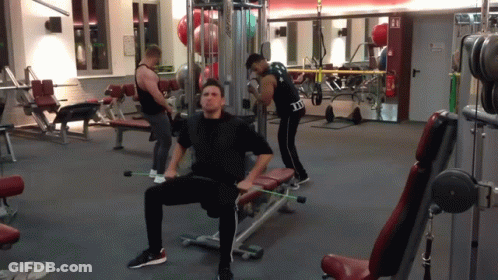 Man Sitting On Gym Bench In I Love You Shirt GIF