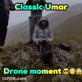 Man Sitting On Hill Saying Classic Umar Drone Moment GIF