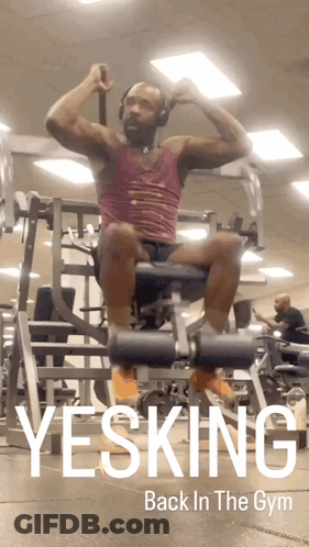 Man Sitting On Machine Saying Yesking Back In The Gym GIF