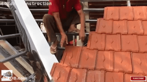 Man Sitting On Roof With Subscribe Button GIF