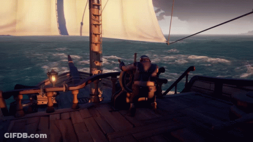 Man Sitting On Ship Steering Wheel GIF