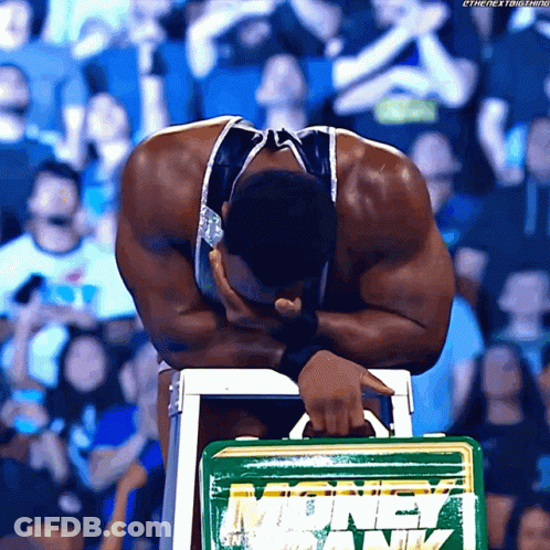 Man Sitting On Stool Holding Green Money Bank GIF