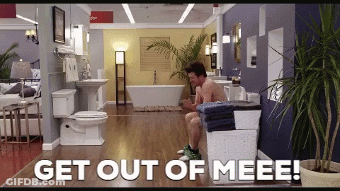 Man Sitting On Stool In Bathroom GIF