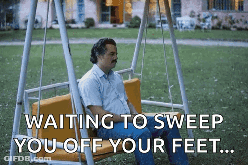 Man Sitting On Swing Waiting To Sweep You Off Feet GIF
