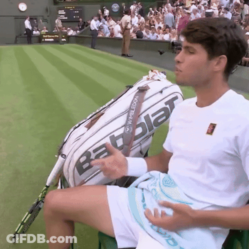 Man Sitting On Tennis Court With Babolat Bag GIF