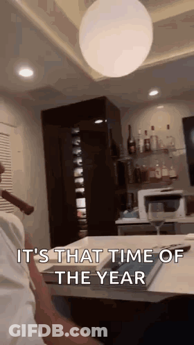 Man Sitting Smoking Cigar In Living Room GIF