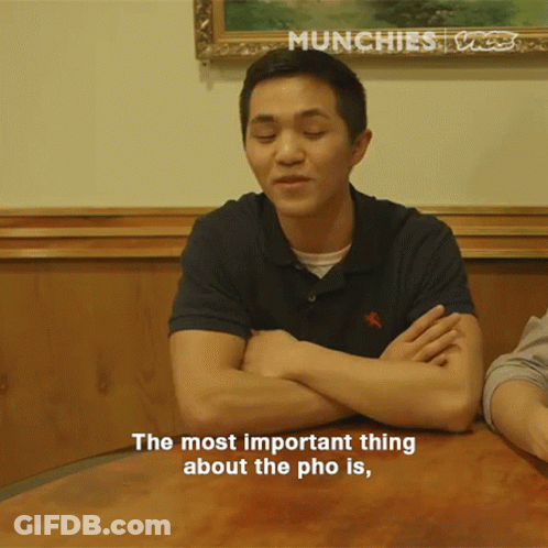 Man Sitting With Arms Crossed Saying The Most Important Thing About The Pho Is GIF