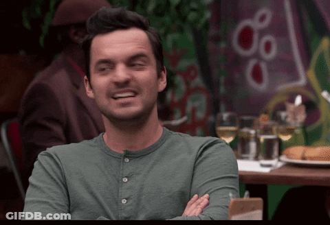 Man Sitting With Crossed Arms GIF