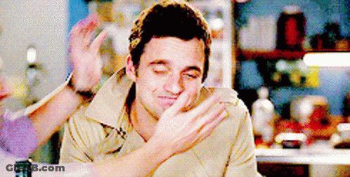 Man Sitting With Eyes Closed And Hands Up GIF