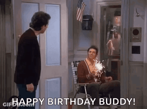 Man Sitting With Sparkler Saying Happy Birthday Buddy GIF
